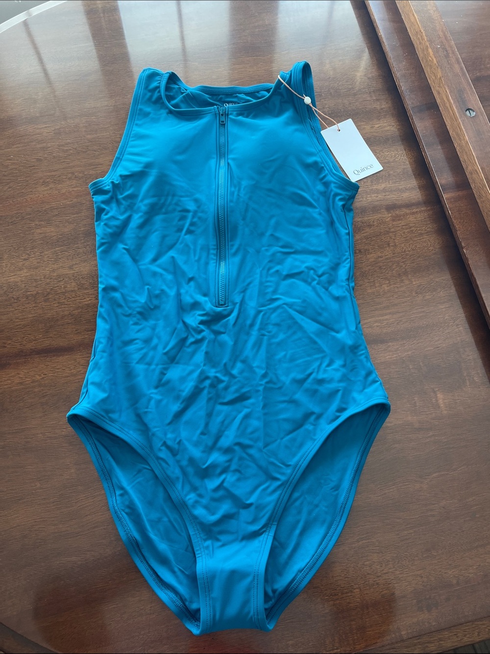 Woman’s Teal Sleeveless One-Piece Swimsuit with Front Zip